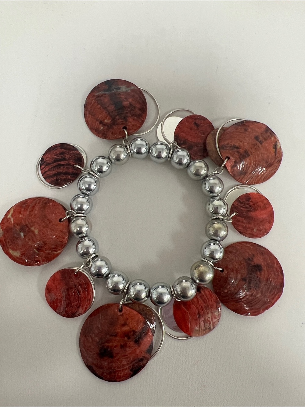 Silver Bead Bracelet with Red Shell Discs